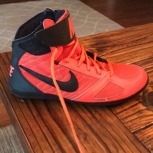 black and orange nike wrestling shoes